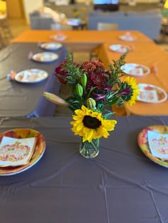 Thanksgiving table with flower centerpiece