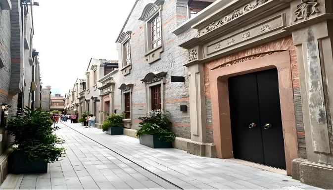 A row of buildings with black doors
AI-generated content may be incorrect.